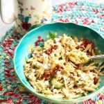 sundried tomato pasta in a blue bowl