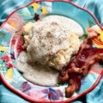 southern white gravy over biscuits with bacon.