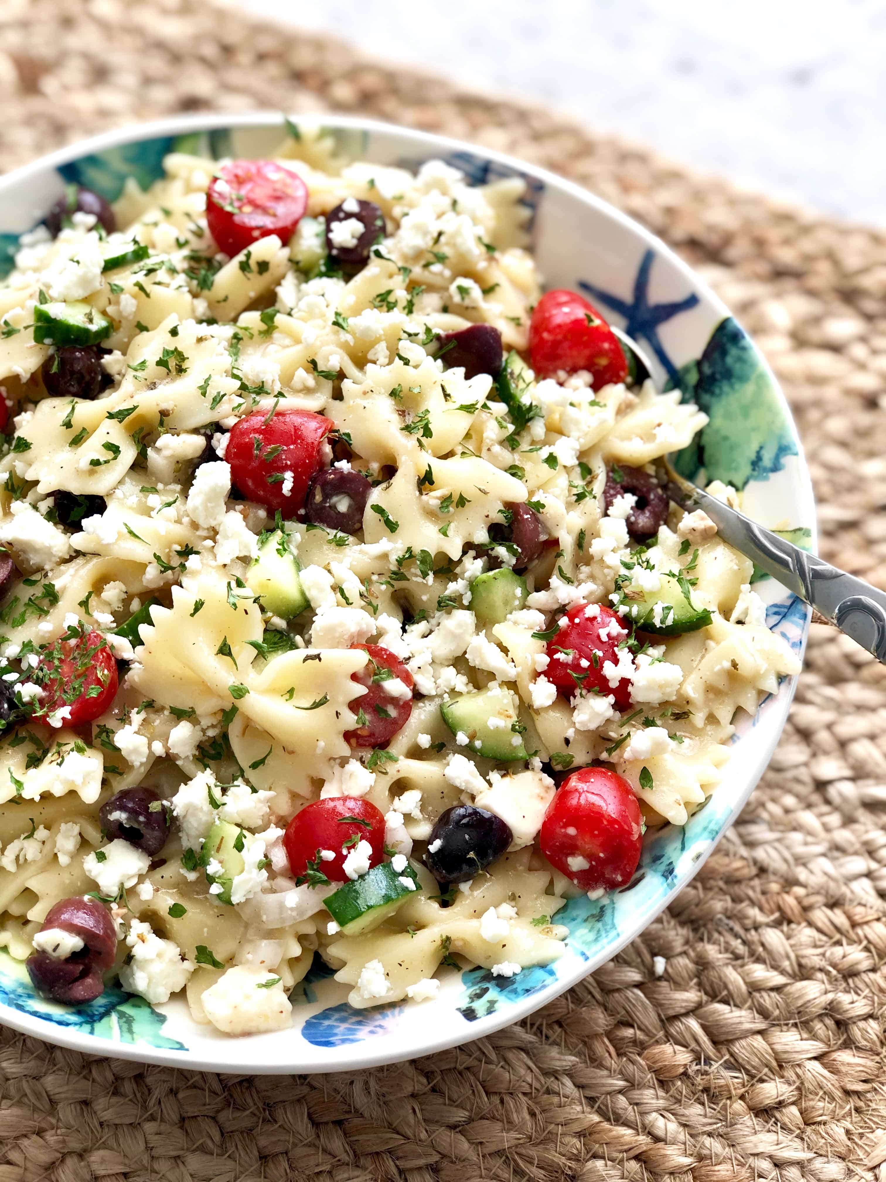 bowtie Greek pasta with veggies in a bowl