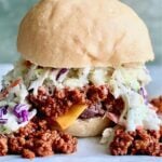 Carolina burger topped with coleslaw, diced onions, zesty chili and mustard.