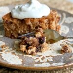 granny tag's prune cake with whipped cream on top