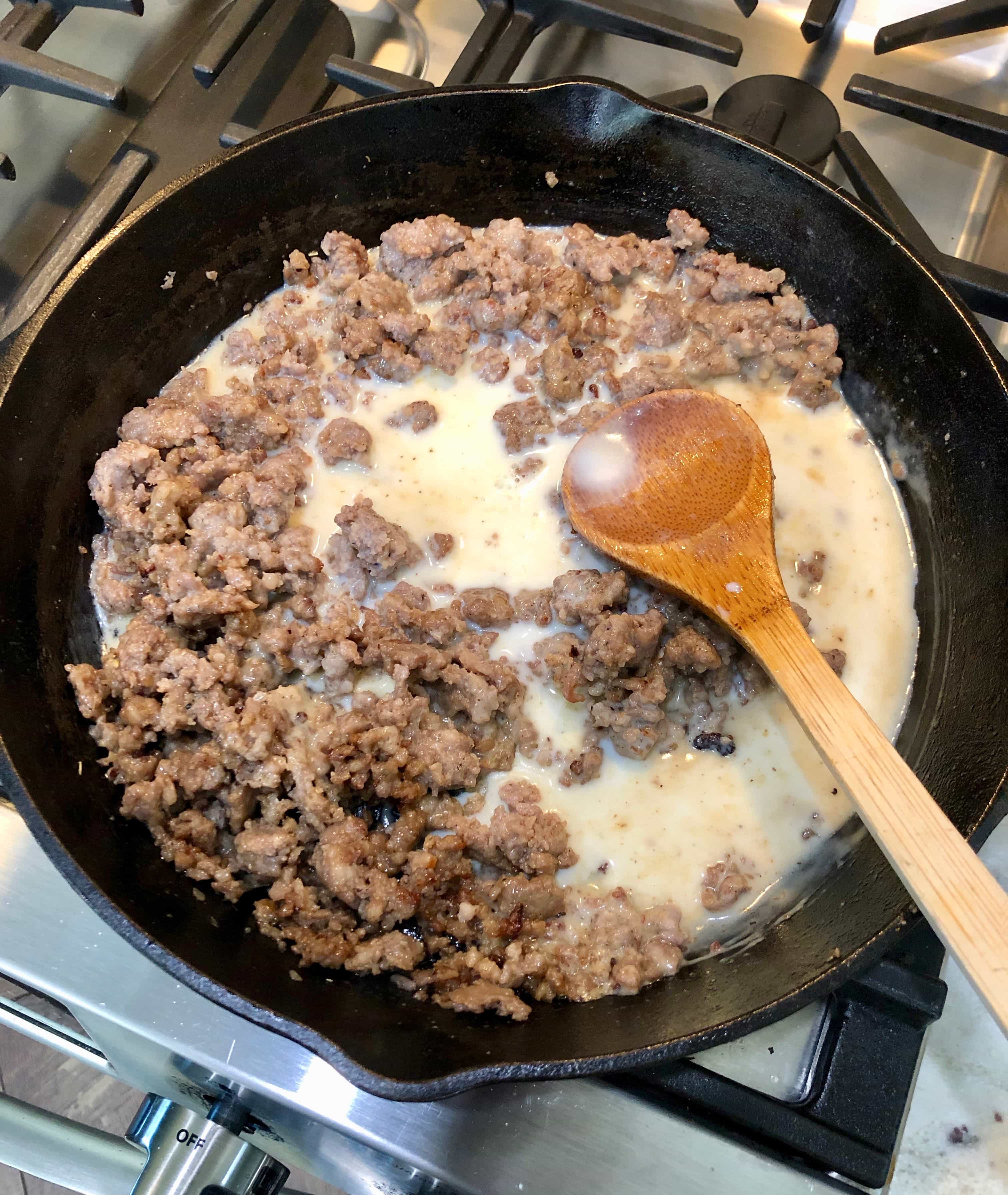 sausage browning in cast iron skillet
