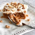 pumpkin spice flip cake on a plate with a fork