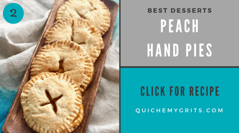 peach hand pies in a flaky crust on a wooden serving dish