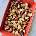 sheet pan taters in a serving dish