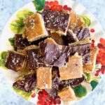 salted chocolate toffee bars on a cake plate