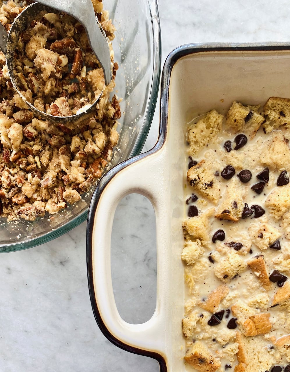 casserole dish with chocolate bread pudding and pecan topping in a separate dish