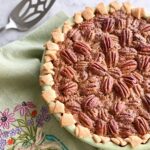 Old Fashioned pecan pie made the traditional way with a criss cross crust.