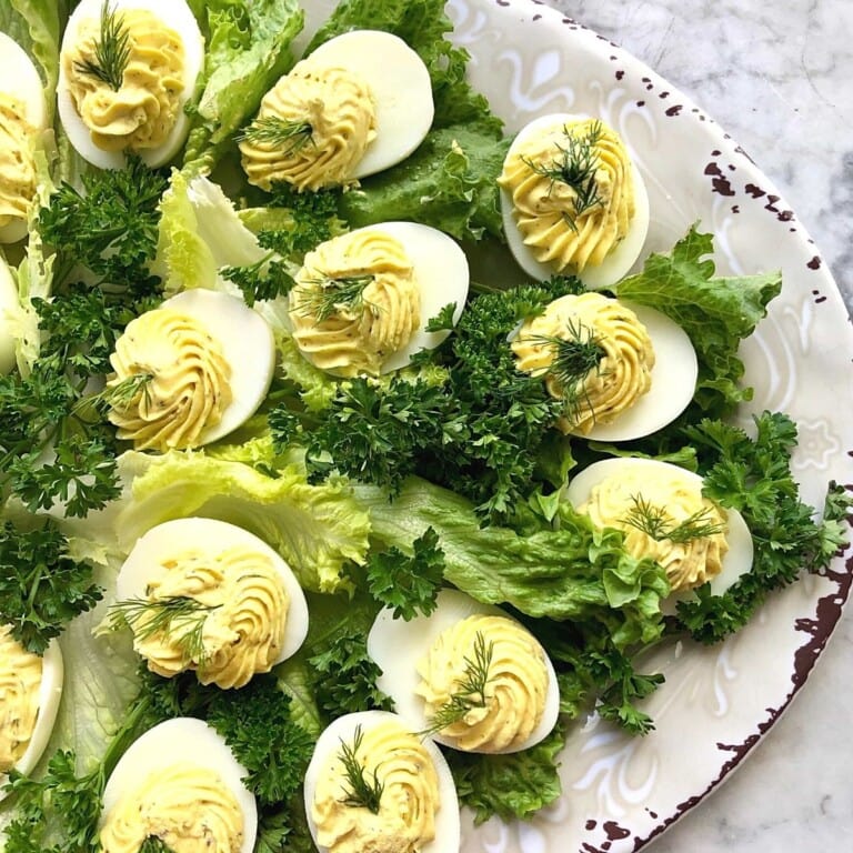 deviled eggs on parsley and lettuce