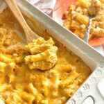 white casserole dish filled with buffalo chicken pasta.