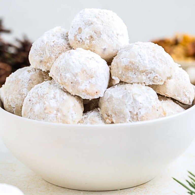 Best walnut snowball cookies recipe in a large bowl.