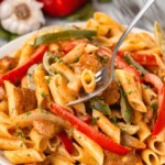 Chicken Fajita Pasta being lifted up by a fork.
