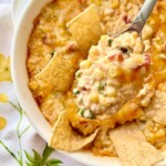 Cream cheese corn dip with cilantro, cream cheese, feta and fresh corn.