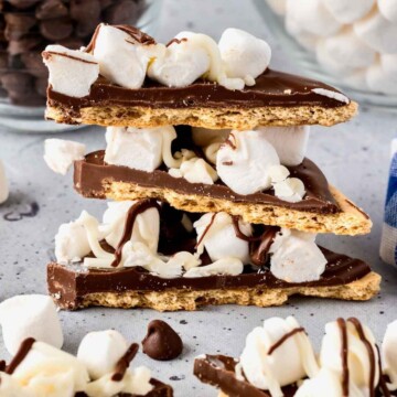 Stack of s'mores bark with graham crackers, chocolate and marshmallows.