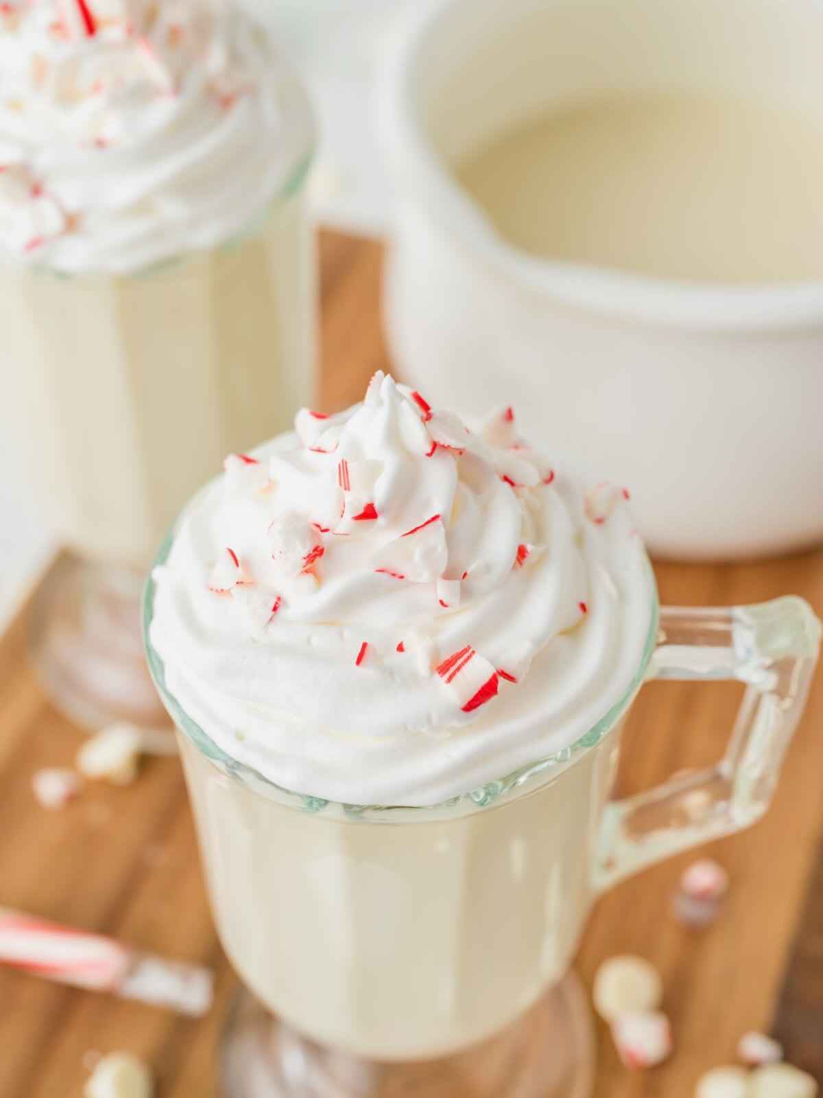 Candy cane pieces on top of whipped cream.