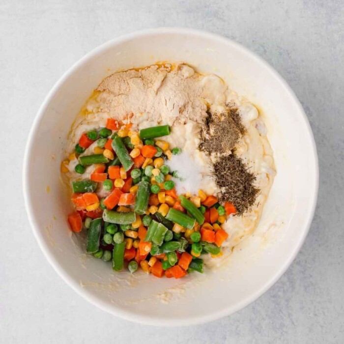 Mixed vegetables added to chicken mixture.