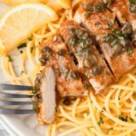 Chicken Piccata and Pasta being served with a fork.