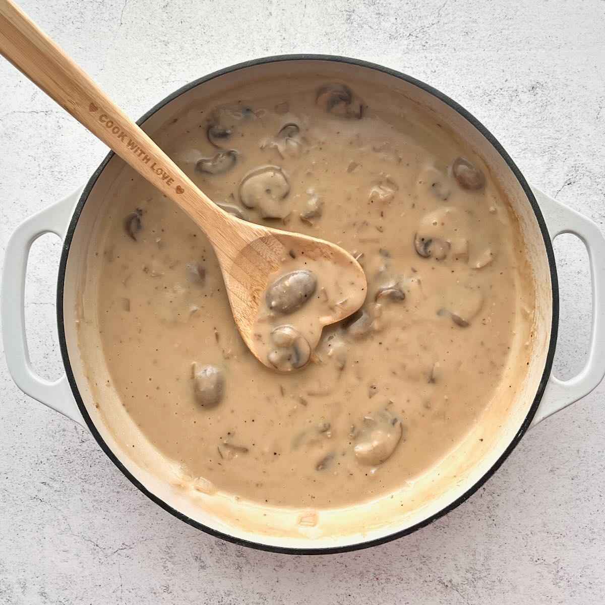 Mushroom gravy after cream has been added.