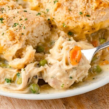 Fork taking a bite out of Bisquick Chicken and Dumplings.