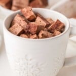 A cup of mini chocolate marshmallows.